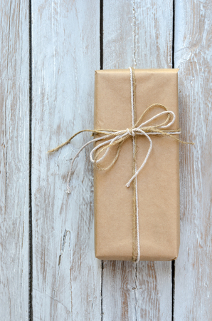 Gift box wrapped with brown paperの写真素材