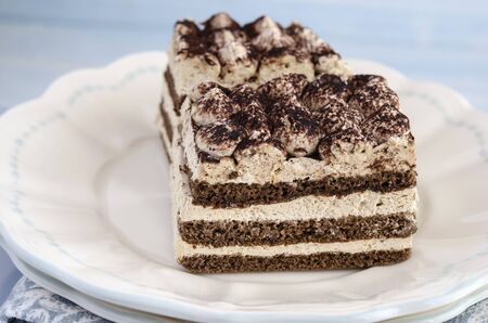 Tiramisu cake served on a plateの写真素材