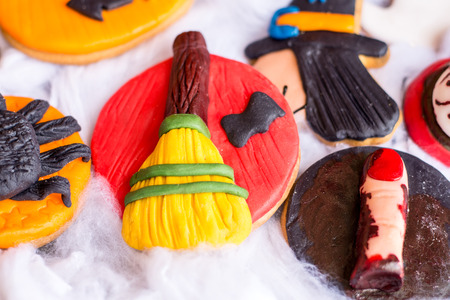 Close-up of delicious homemade cookies on white cotton.Halloween theme.の写真素材