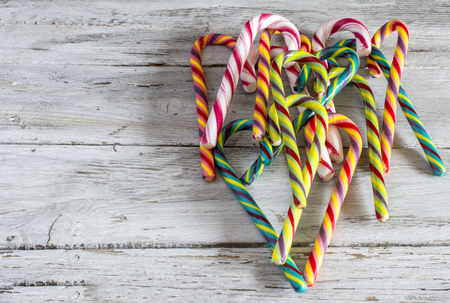 Candy canes on a tableの写真素材