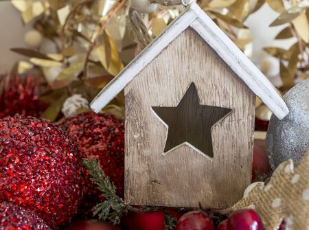 Cute star-windowed house Christmas decoration. Horizontal indoors shot. の写真素材
