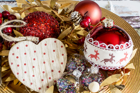 Various Christmas decorative things on a plate. Horizontal studio shotの写真素材