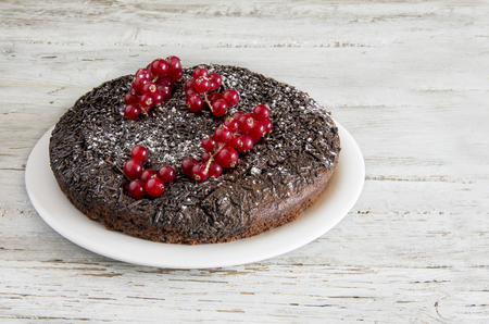 Chocolate Christmas cake with currantsの写真素材