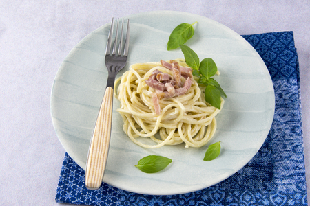 Spaghetti with carbonara sauce and baconの写真素材