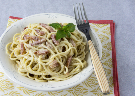 Spaghetti with carbonara sauce and baconの写真素材