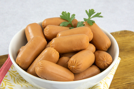 Raw aperture sausages served in a bowlの写真素材
