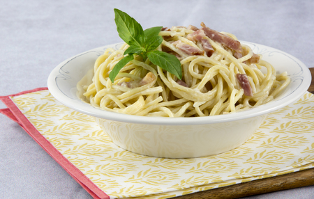 Spaghetti with carbonara sauce and baconの写真素材