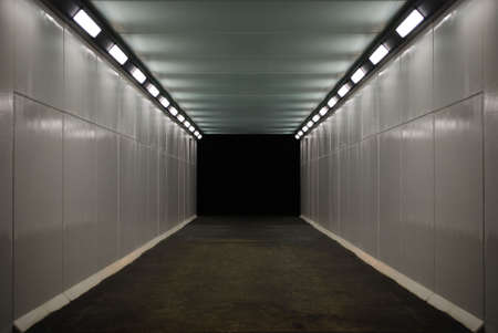 Underground tunnel lit up at night