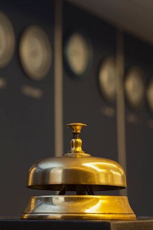 old hotel bell on a marble standの写真素材