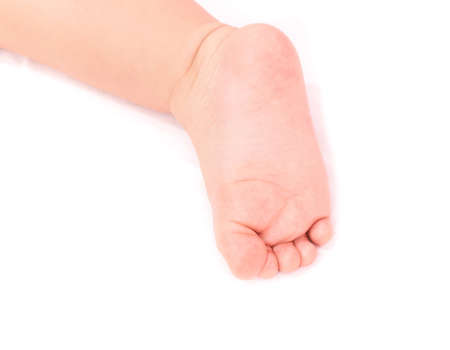baby foot 9-12 month isolated in white background