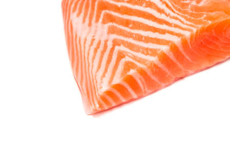 salmon fish fresh meat slice isolated on white backgroundの写真素材