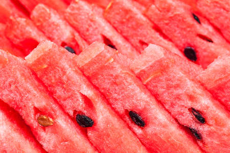 red watermelon sliced, fresh fruit backgroundの写真素材