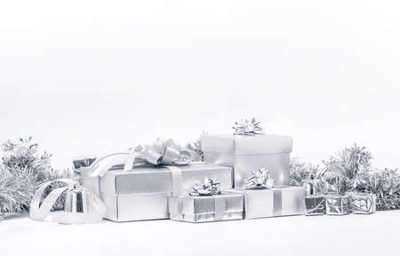 Celebration silver gift boxes for decoration on white backgroundの写真素材