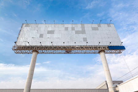 Blank big billboard with blue sky ready for new advertisementの写真素材
