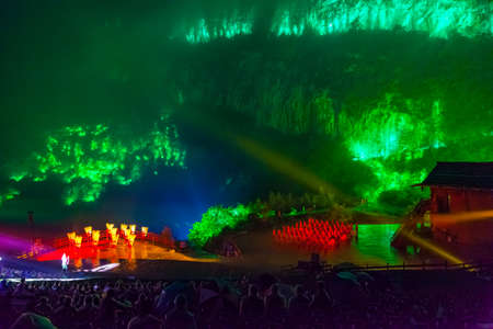 Chongqing China, September 17, 2015 : Impression Wulong, The real scene show premiered in the Peach Garden Canyon in Wulong County, involving more than 100 performers and having Zhang Yimou as the art adviser and directorの写真素材