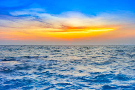 beautiful sunset at the sea with colorful shading of sunlight and skyの写真素材