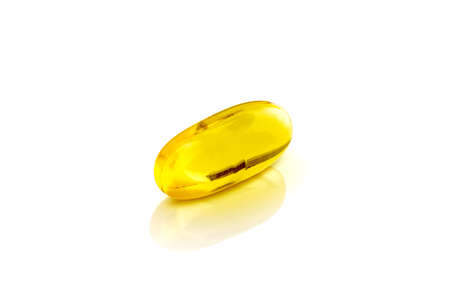 Fish oil soft gel supplement capsule source of omega and vitamins isolated on white background