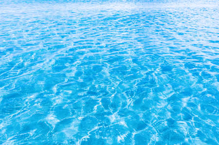 Beautiful ripple wave of light blue water surface background, natural marine blue water surface for...