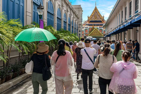 BANGKOK, THAILAND - JUNE 6, 2019 : Unidentified tourists at the gate of Wat Phra Kaew Temple in Bangkok capital, Wat Phra Kaew Temple of the Emerald Buddha an important destination and popular landmark in Bangkok Thailand.のeditorial素材