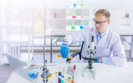 Scientist working or research for some confidential in chemical laboratory, Science and healthy or medical conceptの写真素材