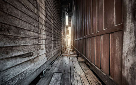 darkness dangerous walk alley in the city, crime and hazard background conceptの写真素材