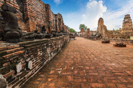 Ancient Statue of Buddha and Archaeological site at Ayutthaya Historical Park, Ayutthaya Province, Thailand.の写真素材