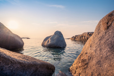 Beautiful scenery seascape in morning colorful sunrise at Lan Hin Khao Beach, Rayong province, Thailandの写真素材