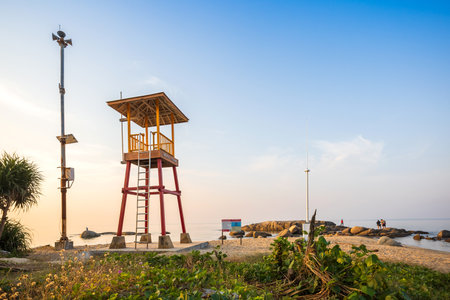 Observe tower for beach guard at Lan Hin Khao Beach with beautiful scenery seascape in morning sunrise, Rayong province, Thailandの写真素材