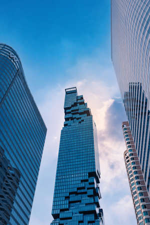 BANGKOK, THAILAND - APRIL 14, 2021: Mahanakorn sky scraper the higher modern building landmark with Sathorn Square commercial office and W hotel at Sathorn bussiness center of Bangkok cityのeditorial素材