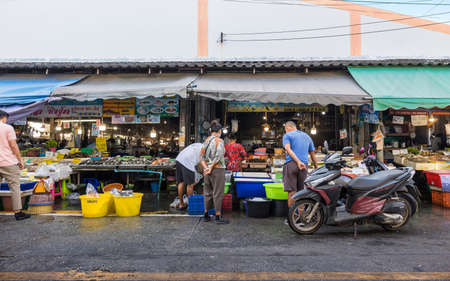 Rayong, Thailand - 2021 November 07 : Fresh seafood market after Covid-19 government curfew at Ban Phe harbour village to ferry for Koh Sa-med island, Rayong Province, Thailandのeditorial素材