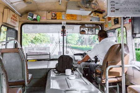 BANGKOK THAILAND - July 26 2017 : Thai bus driver in control seat in back view. Bangkok Thailand...