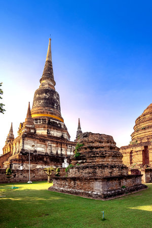 Historical Architecture, Wat Yai Chai Mongkol old temple in Ayutthaya province Thailand at the sunrise morningの写真素材