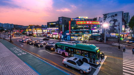 Suwon, South Korea: July 30, 2023: The traffic on street opesite of Suwon Hwaseong Fortress's...