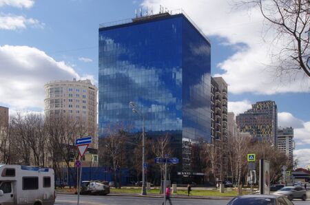 Clouds are reflected in the mirrored surface of the houseのeditorial素材