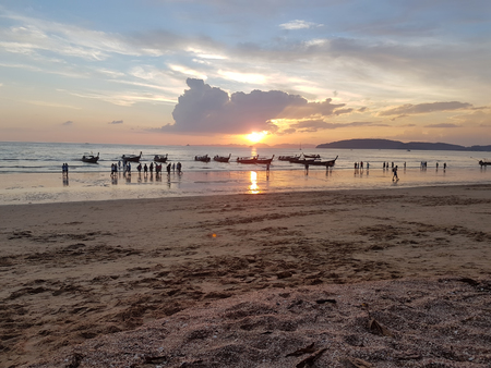 Beautiful sunset on the beach and seaの写真素材