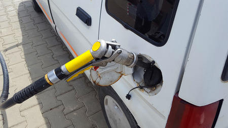 Pumping gas in car