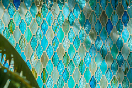 Blue and aqua glass tile wall in the Enid A. Haupt Garden, Smithsonian Castle, Washington, D.C., USA.のeditorial素材