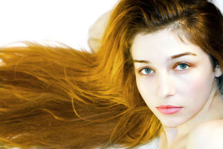 Portrait of a girl with long, rich and beautiful hairの写真素材