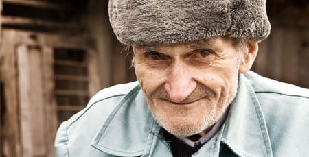 Close-up portrait of smiling old manの写真素材