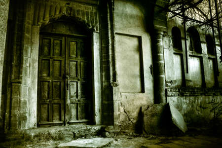 Front of a creepy old house - vintage greenish versionの写真素材