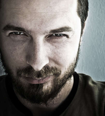 Close-up portrait of man with deep sparkling eyesの写真素材