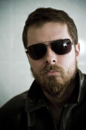 Tough guy with sunglasses (shallow DOF)の写真素材