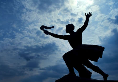 Statue of torch-bearer on Gellert Hill, Budapest (capital of Hungary)の写真素材