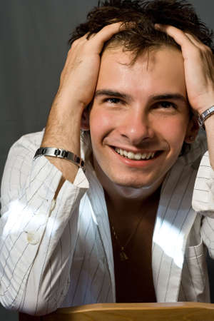 Portrait of cheerful young handsome manの写真素材