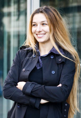 Outdoor portrait of happy young businesswomanの写真素材