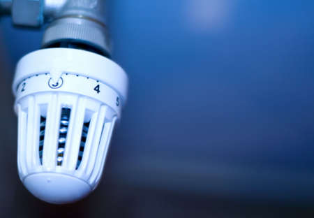 Close-up on white thermostat with lots of copy-spaceの写真素材