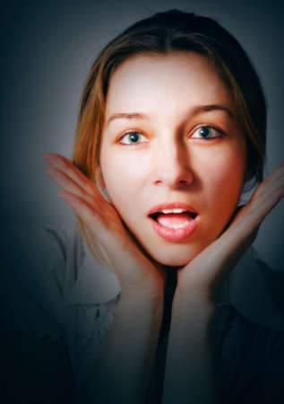 Unusual portrait of suprised young woman