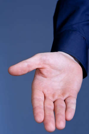 Businessman hand offered for help and assistance