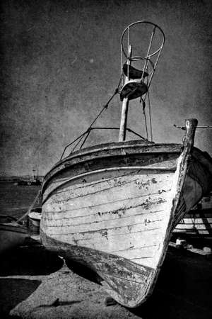Vintage image of wreck old wooden boatの写真素材
