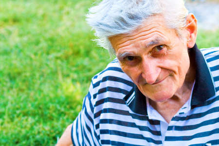 Outdoor portrait of one confident senior manの写真素材